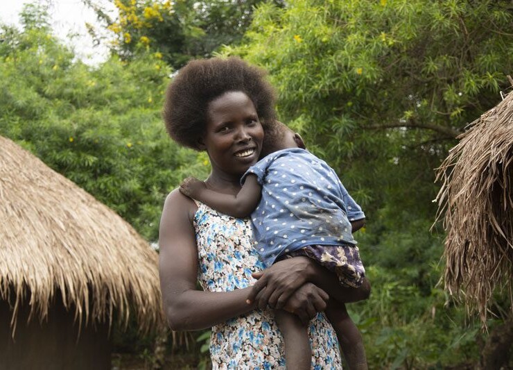 kvinna med barn, uganda